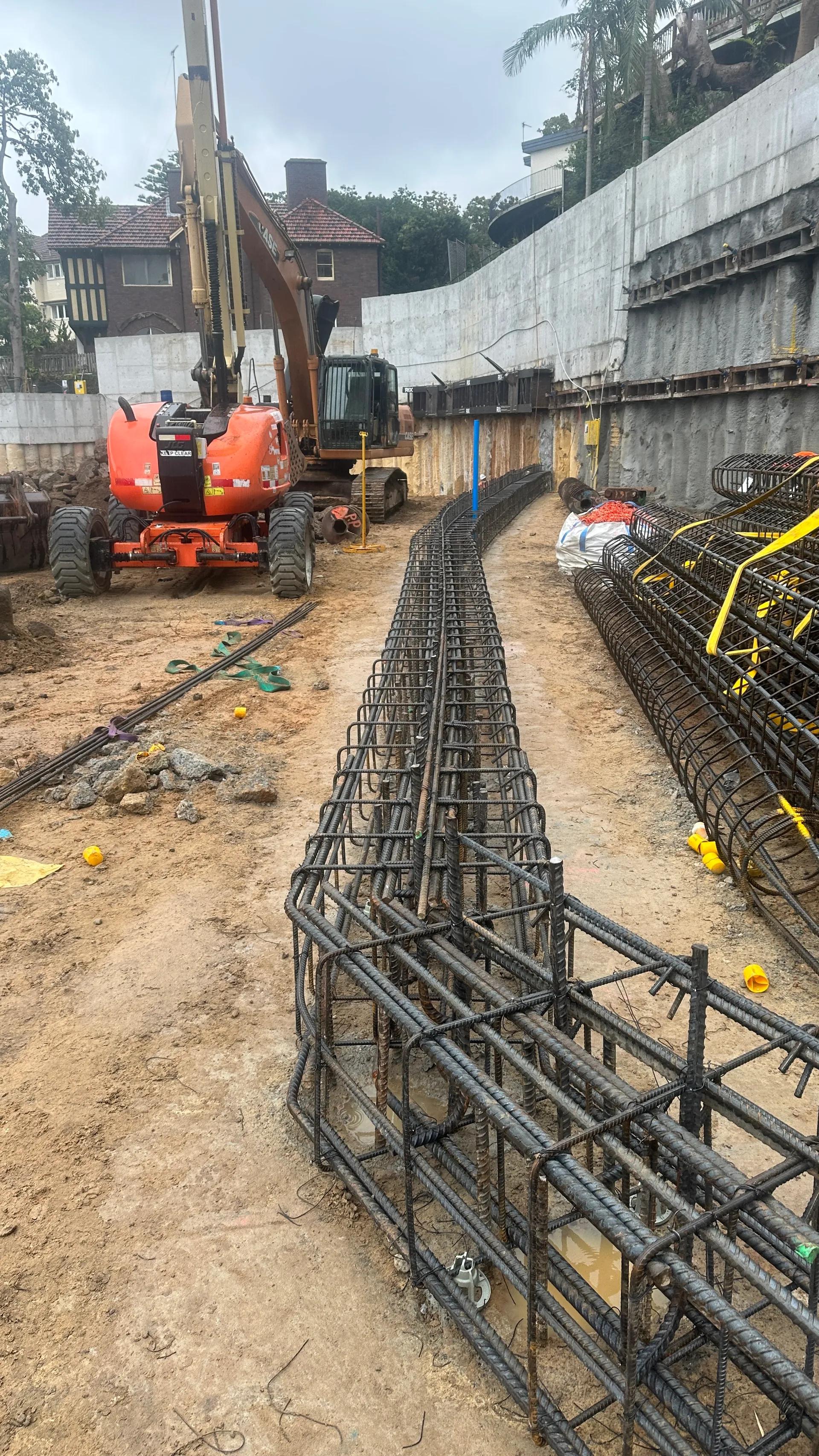 IN SITU REINFORCEMENT WALLS, CAPPING BEAM AND COLUMNS